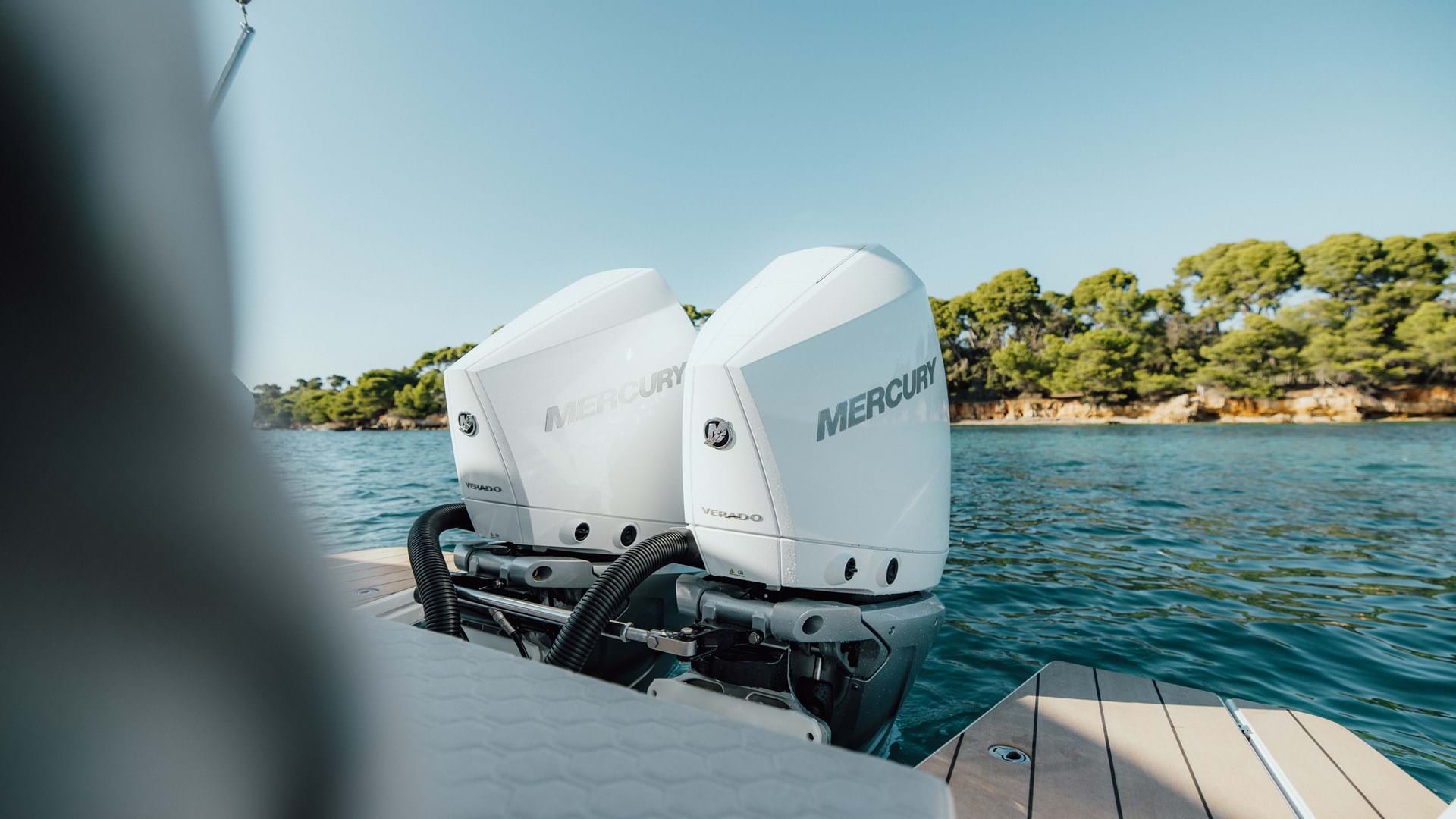 Twin 250 hp V8 Mercury outboards on the Coupe 905 wheelhouse boat.